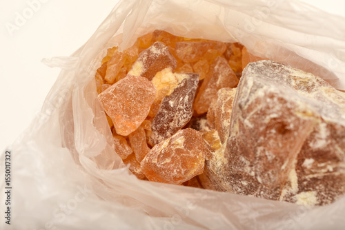 Pine rosin in a package. Solid pine resin flux for soldering.