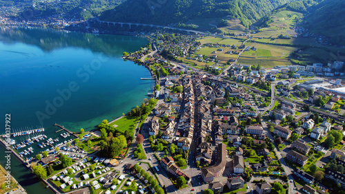 A panoramic aerial view around the old town of the city Villeneuve in Switzerland on a sunny spring noon