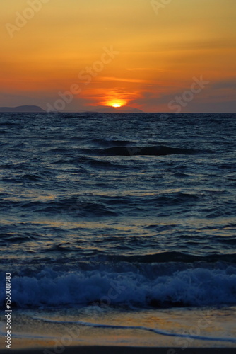 Close-up of empty sky and sun for copy space. The spectacular view of the sunset was breathtaking, with the sun sinking behind the clouds on the horizon.