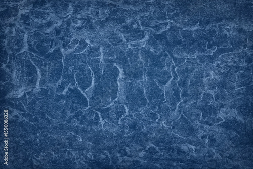 Texture of blue polished concrete background. Dark plaster wallpaper with rough cement texture. Empty grunge wall concept or floor backdrop. Abstract surface mockup. Top view, close up, copy space