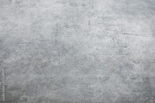 Texture of gray polished concrete background. Light plaster wallpaper with rough cement texture. Empty grunge wall concept or floor backdrop. Abstract surface mockup. Top view, close up, copy space