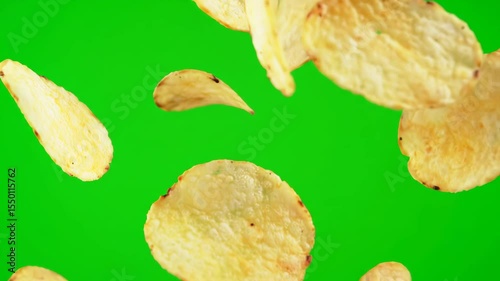 Falling Potato Chips on Green Screen Background