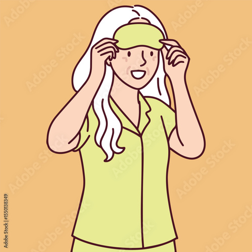 Elderly woman with white hair wears pajamas and puts on sleeping mask preparing for restful sleep and nighttime wellness routine