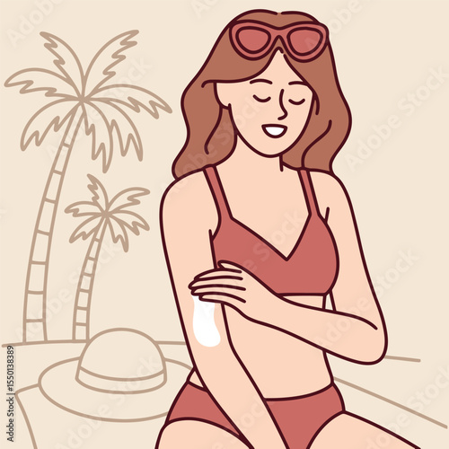 Young woman in bikini applies sunscreen to her shoulder while sitting on beach near palm trees. She prepares skin for sun exposure and UV protection