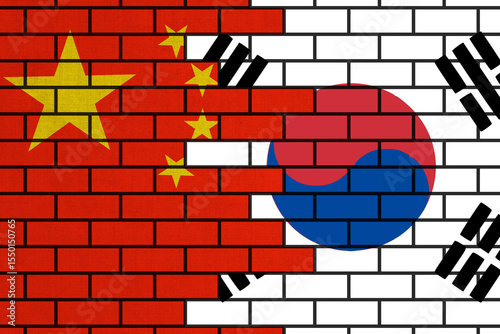 colourful painted big national flag of china and flag of south korea on a massive old brick wall background. concept photo