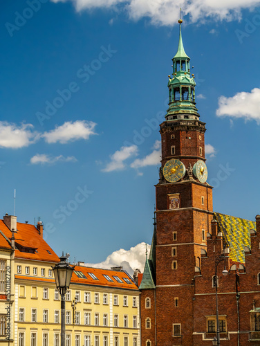 Historic Townhouse with Clock Under Clear Blue Sky, Wroclaw, Poland