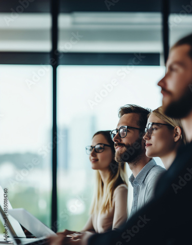 businesspeople working in office, beautiful young crowd of professionals, experts, learning and development, business themed, smiling and engaged