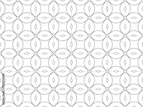 Seamless geometric pattern with quatrefoil and diamond shapes in black and white