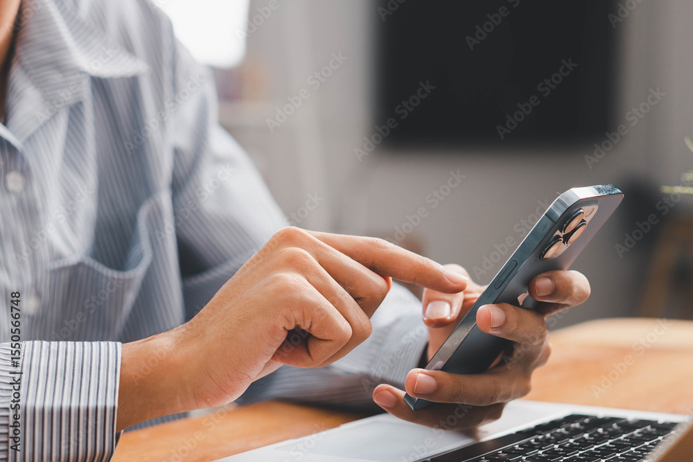 Fototapeta premium Laptop, hands and businessman with cellphone in office for online email communication for corporate review. Technology coffee and hr with computer and phone for reading company policy on internet,