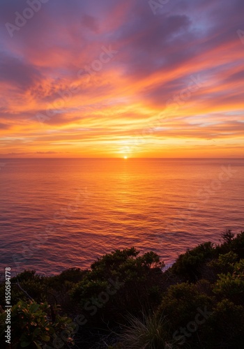 Vibrant Sunset over Calm Ocean