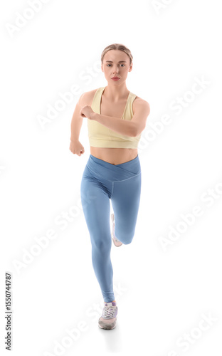 Sporty young woman running ...