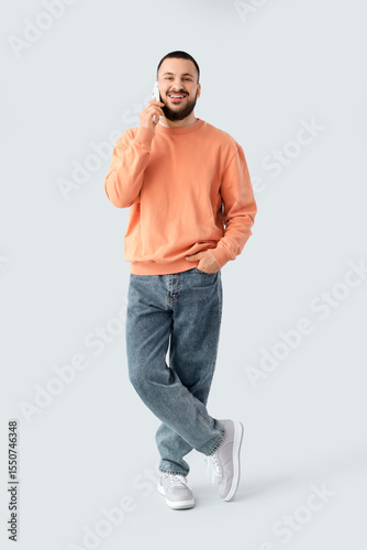 Young man with beautiful sm...