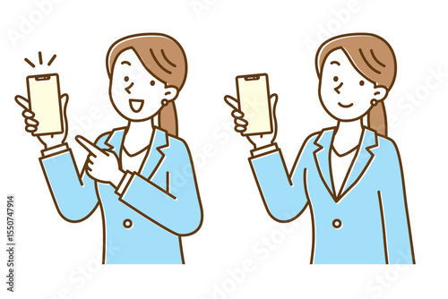 スマートフォンを持ってこちらを見ているスーツ姿の若い女性