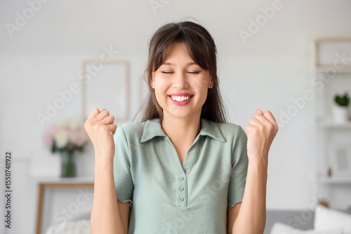 Portrait of smiling young w...
