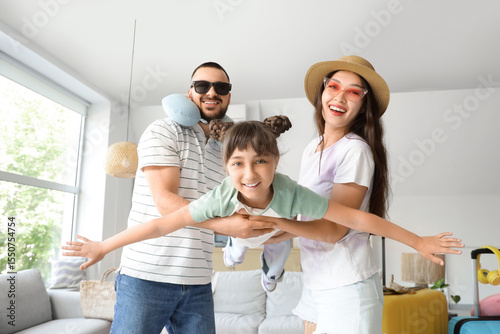 Happy family of tourists ha...