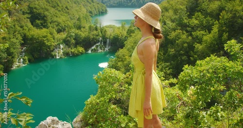 Wallpaper Mural Woman overlooking waterfalls and lakes in Plitvice park on summer sunny day Torontodigital.ca