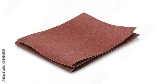 Folded sandpaper against white background