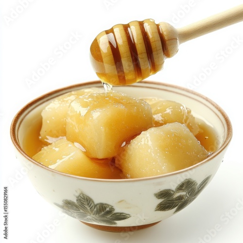 A different delicious Filipino dessert, Kesong Puti with a drizzle of honey, served in an elegant bowl,