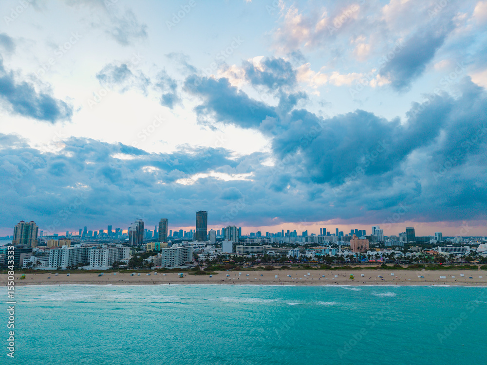 Naklejka premium Aerial view of Miami Beach city by the coast. Miami Beach skyline. Scenic Miami Beach panorama famous coastline.
