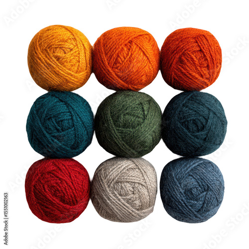 Nine balls of yarn in autumnal colors arranged in a square
