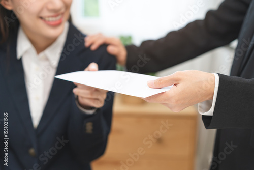 Good job Asian manager businesswoman giving financial reward in an envelope, business letter extra salary to company employee, woman worker office hand received premium bonus, getting cheque from boss