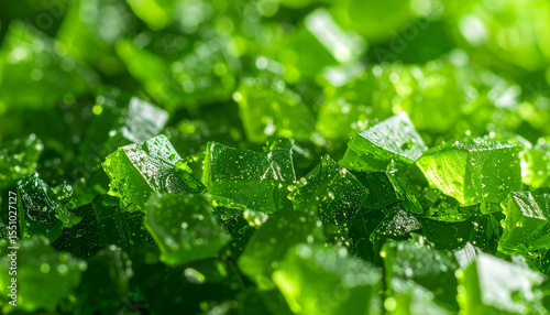 Sweet Emerald Bites: A macro shot captures the delectable essence of green, gel-like candy cubes, inviting the viewer with their vibrant color and captivating texture.