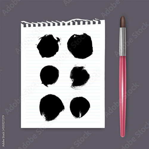 Set of hand painted brush strokes on white piece of notebook