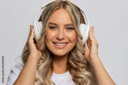 Modern Beauty in Chic Attire Relaxes to Quality Sound in Minimal Studio
