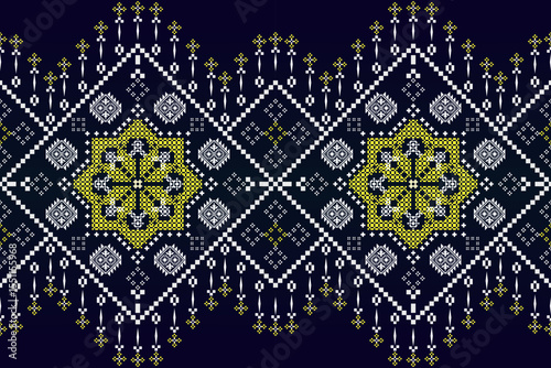 Striking seamless ethnic pixel pattern with glowing neon tribal and floral-inspired motifs in vibrant purple, pink, and cyan on a dark teal background. Perfect for modern fashion and digital designs.