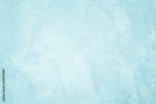 Pastel blue and white concrete stone texture for background in summer wallpaper. Cement and sand wall of tone vintage. Concrete abstract wall of light cyan color, cement texture mint green for design.