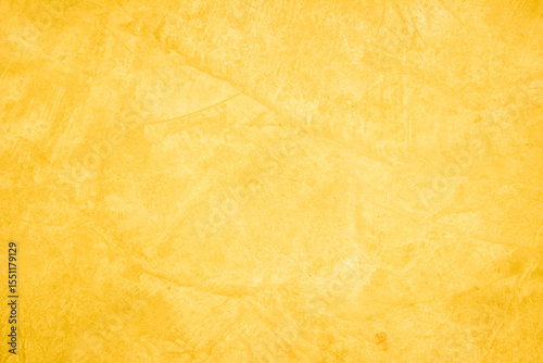 Yellow concrete stone texture for background in summer wallpaper. Cement and sand wall of tone vintage minimal. Concrete abstract wall of light yellow color, cement texture white blank for home decor.