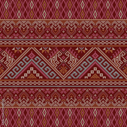 A richly detailed Thai pattern in warm maroon tones, combining ethnic symmetry and geometric pixel precision for decorative fabric, wall art, and crafts.