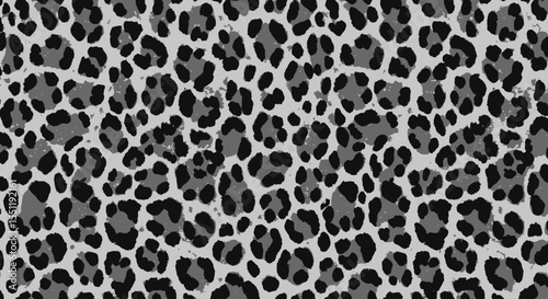 Seamless leopard print texture in shades of gray for backgrounds or textile design