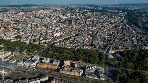 Fototapeta Naklejka Na Ścianę i Meble -  An Aerial panorama view with pan of the old town around the city Reims in France on a sunny spring noon