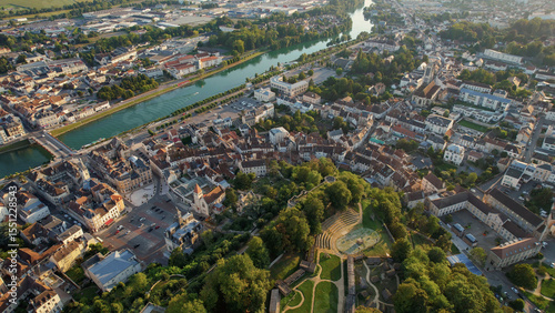 An Aerial panorama view with pan of the old town around the city Château-Thierry in France on a sunny spring noon