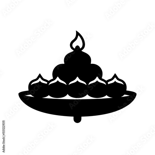 black silhouette of sweets platter with diya on wh.svg