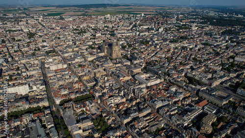 Fototapeta Naklejka Na Ścianę i Meble -  An Aerial panorama view with pan of the old town around the city Reims in France on a sunny spring noon