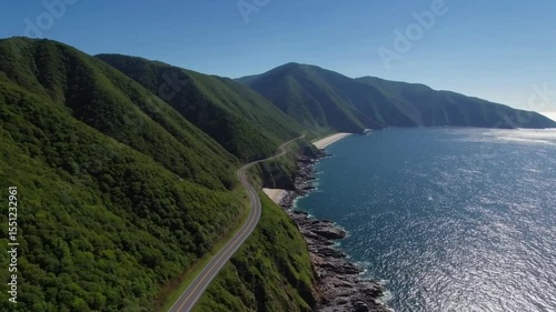 Wallpaper Mural Drone Shot of Scenic Coastal Road Between Lush Mountains and Clear Blue Sea in West VirginiaVideo Background Torontodigital.ca