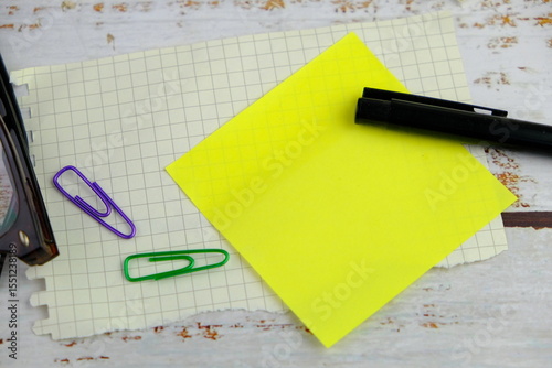flatlay of a workplace with a notebook, on a plain background. Education, business and office concept. 