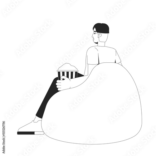 Young chinese man enjoying popcorn on bean bag 2D line character. Snack time. Movie night. Asian boy with striped bucket in beanbag isolated vector ink outline person. Monochromatic spot illustration