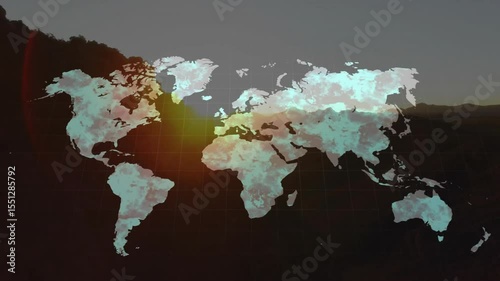 Sunrise lens flare emerging behind map outline filling clouds spreading across globe for dawn scene