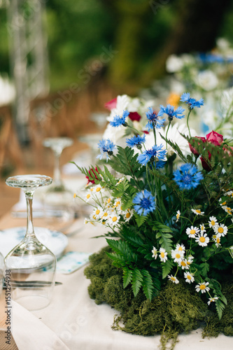 Wedding decor with a bouquet of cornflowers