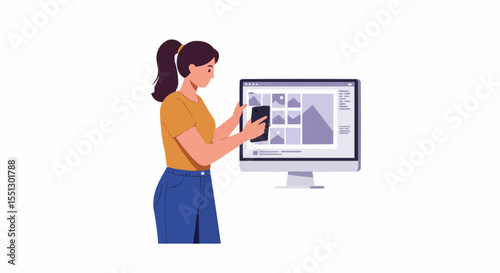Woman at her computer using a phone and screen