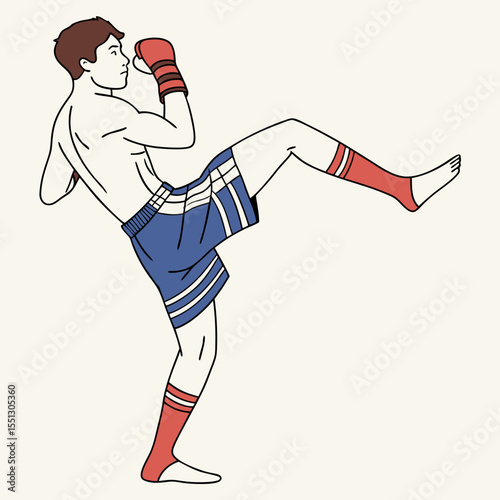 Dynamic action pose of a male kickboxer executing a powerful kick technique
