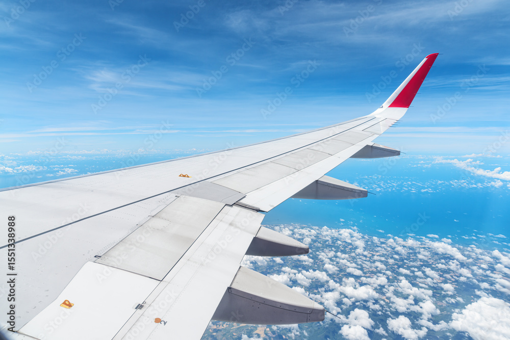 Fototapeta premium Awesome view of the Earth under the airplane wing
