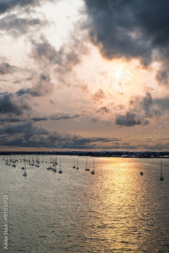 Sunset of Yachts over Ramshorn Lake and Brownsea, Poole, Dorset, England photo