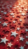 Numerous decorative red and silver stars on flat surface indoors