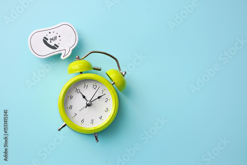 Inscription: 24/7 and an alarm clock nearby, a concept of 24/7 assistance, services, and actions