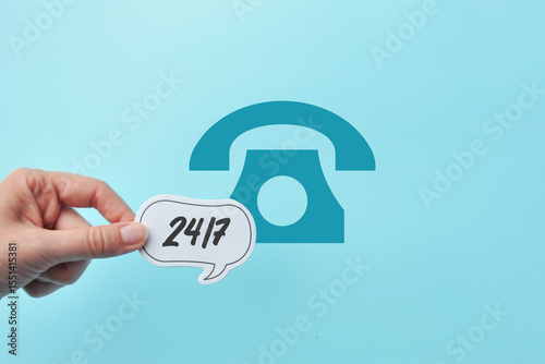 Inscription: 24/7, the concept of 24/7 assistance, services, and actions