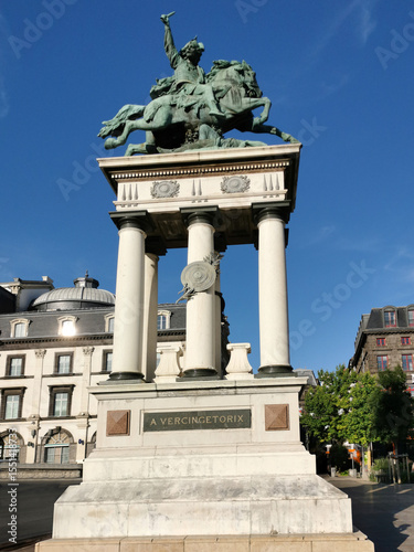 Statue of Vercingetorix by Bartholdi stands tall in Place de Jaude, Clermont-Ferrand, showcasing history and artistry in Auvergne, France